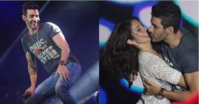Gustavo Lima tenta beijar fã (Crédito: Reprodução)