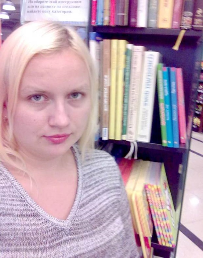 Esposa de Oleg, Yulia, 32 anos