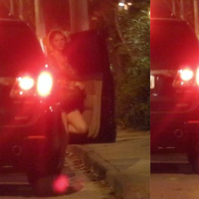 Bárbara Evans passa quase uma hora no carro de Cauã Reymond e desce arrumando a saia