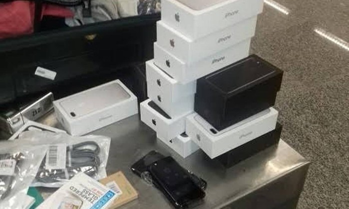 Caixa dos celulares estavam nas malas dos passageiros