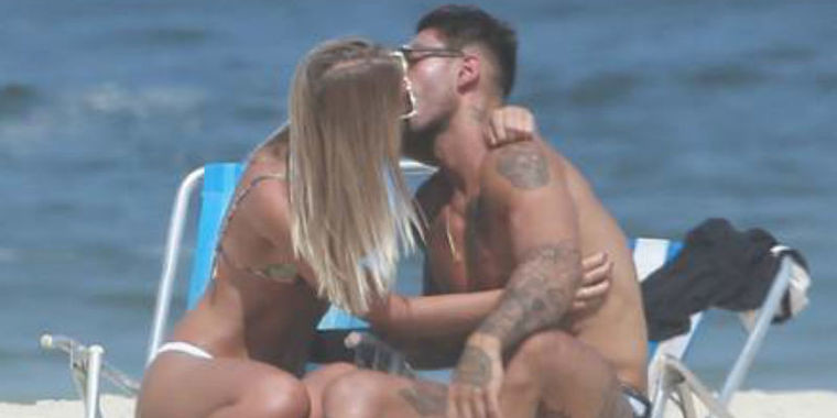 Lucas Lucco é flagrado aos beijos com modelo em praia
