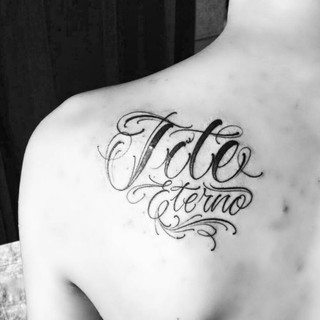 Jovem fez tatuagem em homenagem a Tite (Crédito: Reprodução)