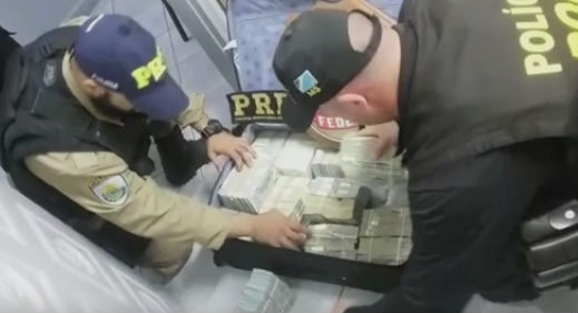 Polícia Rodoviária Federal apreende US$ 2,4 milhões no MS (Crédito: Reprodução)