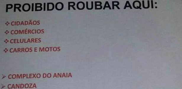 Cartazes foram espalhados com mensagesns proibindo roubos em favela do Rio (Crédito: Reprodução)