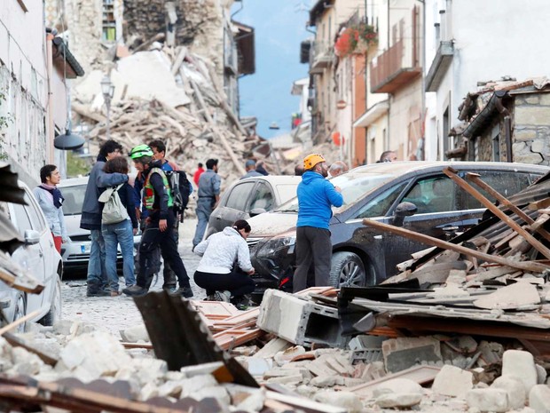Casas e prédios totalmente destruídos (Crédito: Remo Casilli/Reuters))