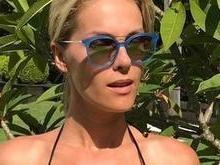 Ana Hickmann mostra barriga sarada em dia de piscina