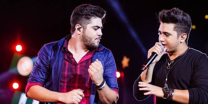 Táxi com Henrique e Juliano roda na pista durante trajeto para show