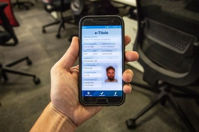 e-Título pode ser acessado pelo celular após download de aplicativo que leva o mesmo nome (Crédito: Fabio Tito)