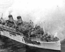 Navio de cruzeiro incendeia e afunda na Ilha Madeira e 128 morrem