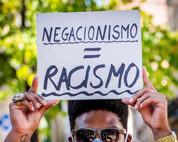 Negacionismo e racismo, tristes realidades para tempos de crise