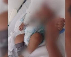 Bebê morre após ser atingido por celular que o pai jogou na esposa